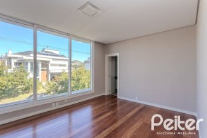 Casa em Condomínio à venda com 400m², 4 dormitórios, 4 suítes, 4 vagas, no bairro Alphaville em PORTO ALEGRE