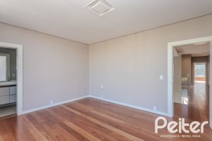 Casa em Condomínio à venda com 400m², 4 dormitórios, 4 suítes, 4 vagas, no bairro Alphaville em PORTO ALEGRE