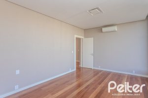 Casa em Condomínio à venda com 400m², 4 dormitórios, 4 suítes, 4 vagas, no bairro Alphaville em PORTO ALEGRE