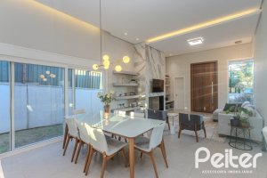 Casa em Condomínio à venda com 206m², 3 dormitórios, 3 suítes, 7 vagas, no bairro Alphaville em PORTO ALEGRE