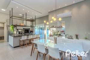 Casa em Condomínio à venda com 206m², 3 dormitórios, 3 suítes, 7 vagas, no bairro Alphaville em PORTO ALEGRE