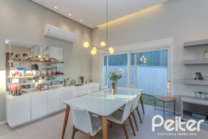 Casa em Condomínio à venda com 206m², 3 dormitórios, 3 suítes, 7 vagas, no bairro Alphaville em PORTO ALEGRE