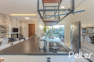 Casa em Condomínio à venda com 206m², 3 dormitórios, 3 suítes, 7 vagas, no bairro Alphaville em PORTO ALEGRE