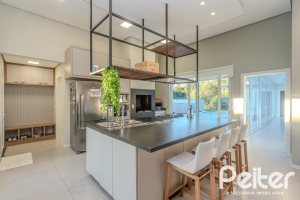 Casa em Condomínio à venda com 206m², 3 dormitórios, 3 suítes, 7 vagas, no bairro Alphaville em PORTO ALEGRE