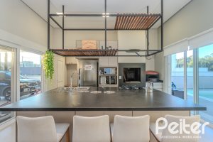 Casa em Condomínio à venda com 206m², 3 dormitórios, 3 suítes, 7 vagas, no bairro Alphaville em PORTO ALEGRE