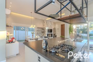 Casa em Condomínio à venda com 206m², 3 dormitórios, 3 suítes, 7 vagas, no bairro Alphaville em PORTO ALEGRE