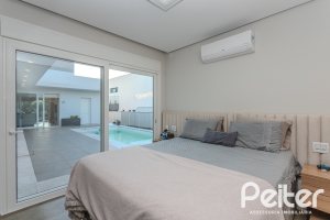 Casa em Condomínio à venda com 206m², 3 dormitórios, 3 suítes, 7 vagas, no bairro Alphaville em PORTO ALEGRE