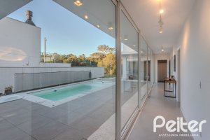 Casa em Condomínio à venda com 206m², 3 dormitórios, 3 suítes, 7 vagas, no bairro Alphaville em PORTO ALEGRE