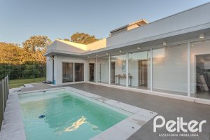 Casa em Condomínio à venda com 206m², 3 dormitórios, 3 suítes, 7 vagas, no bairro Alphaville em PORTO ALEGRE