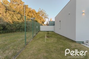 Casa em Condomínio à venda com 206m², 3 dormitórios, 3 suítes, 7 vagas, no bairro Alphaville em PORTO ALEGRE