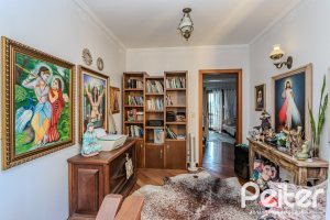 Casa à venda com 446m², 4 dormitórios, 1 suíte, 4 vagas, no bairro Tristeza em Porto Alegre