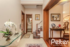 Casa à venda com 379m², 4 dormitórios, 2 suítes, 5 vagas, no bairro Ipanema em Porto Alegre