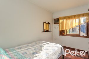 Casa à venda com 379m², 4 dormitórios, 2 suítes, 5 vagas, no bairro Ipanema em Porto Alegre