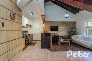 Casa à venda com 379m², 4 dormitórios, 2 suítes, 5 vagas, no bairro Ipanema em Porto Alegre