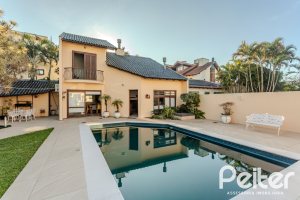 Casa à venda com 379m², 4 dormitórios, 2 suítes, 5 vagas, no bairro Ipanema em Porto Alegre