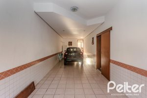 Casa à venda com 379m², 4 dormitórios, 2 suítes, 5 vagas, no bairro Ipanema em Porto Alegre