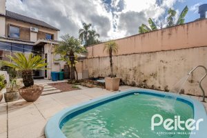Casa à venda com 190m², 3 dormitórios, 1 suíte, 3 vagas, no bairro Ipanema em Porto Alegre