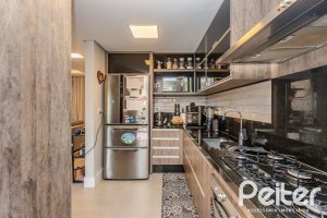 Casa em Condomínio à venda com 208m², 3 dormitórios, 1 suíte, 2 vagas, no bairro Tristeza em Porto Alegre