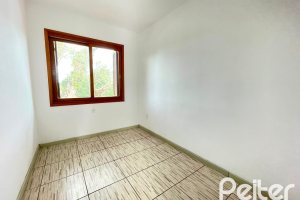 Casa em Condomínio à venda com 97m², 3 dormitórios, 1 suíte, 2 vagas, no bairro Guarujá em Porto Alegre