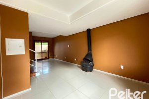 Casa em Condomínio à venda com 97m², 3 dormitórios, 1 suíte, 2 vagas, no bairro Guarujá em Porto Alegre