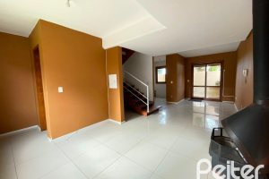 Casa em Condomínio à venda com 97m², 3 dormitórios, 1 suíte, 2 vagas, no bairro Guarujá em Porto Alegre