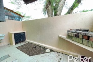 Casa em Condomínio à venda com 97m², 3 dormitórios, 1 suíte, 2 vagas, no bairro Guarujá em Porto Alegre