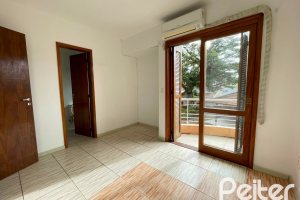 Casa em Condomínio à venda com 97m², 3 dormitórios, 1 suíte, 2 vagas, no bairro Guarujá em Porto Alegre