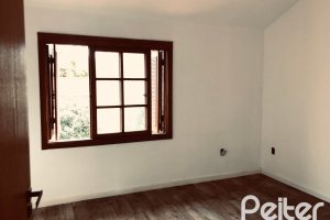 Casa à venda com 286m², 4 dormitórios, 1 suíte, 2 vagas, no bairro Tristeza em Porto Alegre