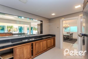 Casa em Condomínio à venda com 361m², 3 dormitórios, 3 suítes, no bairro Terra Ville em PORTO ALEGRE