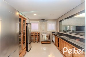 Casa em Condomínio à venda com 361m², 3 dormitórios, 3 suítes, no bairro Terra Ville em PORTO ALEGRE