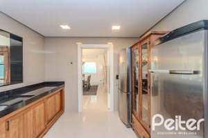 Casa em Condomínio à venda com 361m², 3 dormitórios, 3 suítes, no bairro Terra Ville em PORTO ALEGRE