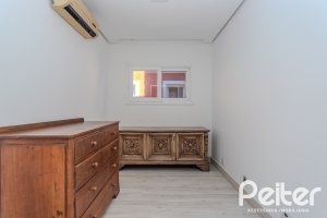 Casa em Condomínio à venda com 361m², 3 dormitórios, 3 suítes, no bairro Terra Ville em PORTO ALEGRE