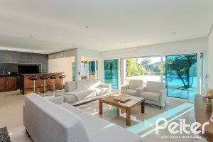 Casa em Condomínio à venda com 361m², 3 dormitórios, 3 suítes, no bairro Terra Ville em PORTO ALEGRE