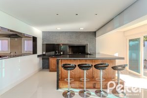 Casa em Condomínio à venda com 361m², 3 dormitórios, 3 suítes, no bairro Terra Ville em PORTO ALEGRE