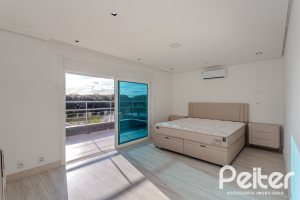 Casa em Condomínio à venda com 361m², 3 dormitórios, 3 suítes, no bairro Terra Ville em PORTO ALEGRE