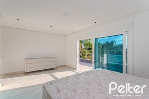 Casa em Condomínio à venda com 361m², 3 dormitórios, 3 suítes, no bairro Terra Ville em PORTO ALEGRE