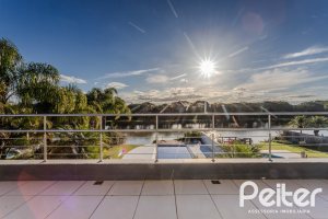 Casa em Condomínio à venda com 361m², 3 dormitórios, 3 suítes, no bairro Terra Ville em PORTO ALEGRE