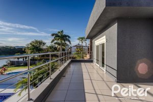 Casa em Condomínio à venda com 361m², 3 dormitórios, 3 suítes, no bairro Terra Ville em PORTO ALEGRE