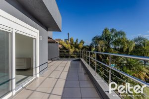 Casa em Condomínio à venda com 361m², 3 dormitórios, 3 suítes, no bairro Terra Ville em PORTO ALEGRE