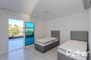Casa em Condomínio à venda com 361m², 3 dormitórios, 3 suítes, no bairro Terra Ville em PORTO ALEGRE