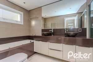 Casa em Condomínio à venda com 361m², 3 dormitórios, 3 suítes, no bairro Terra Ville em PORTO ALEGRE