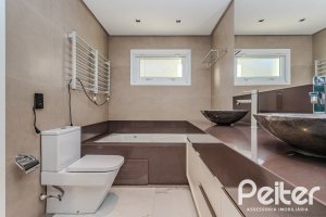 Casa em Condomínio à venda com 361m², 3 dormitórios, 3 suítes, no bairro Terra Ville em PORTO ALEGRE