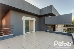 Casa em Condomínio à venda com 361m², 3 dormitórios, 3 suítes, no bairro Terra Ville em PORTO ALEGRE