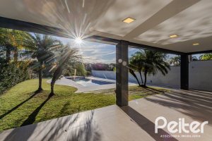 Casa em Condomínio à venda com 361m², 3 dormitórios, 3 suítes, no bairro Terra Ville em PORTO ALEGRE
