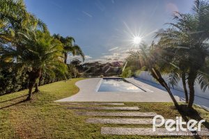 Casa em Condomínio à venda com 361m², 3 dormitórios, 3 suítes, no bairro Terra Ville em PORTO ALEGRE