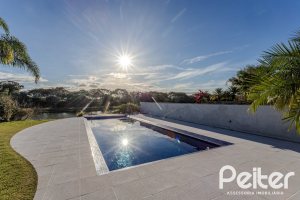 Casa em Condomínio à venda com 361m², 3 dormitórios, 3 suítes, no bairro Terra Ville em PORTO ALEGRE