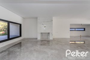 Casa em Condomínio à venda com 392m², 4 dormitórios, 4 suítes, 4 vagas, no bairro Terra Ville em PORTO ALEGRE