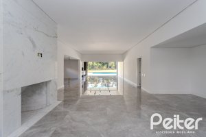 Casa em Condomínio à venda com 392m², 4 dormitórios, 4 suítes, 4 vagas, no bairro Terra Ville em PORTO ALEGRE