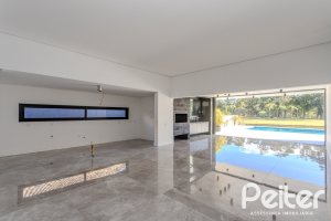 Casa em Condomínio à venda com 392m², 4 dormitórios, 4 suítes, 4 vagas, no bairro Terra Ville em PORTO ALEGRE