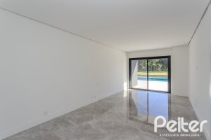 Casa em Condomínio à venda com 392m², 4 dormitórios, 4 suítes, 4 vagas, no bairro Terra Ville em PORTO ALEGRE